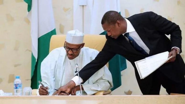 President Muhammadu Buhari and Minister of Justice and Anthony General of the Federation, Abubakar Malami