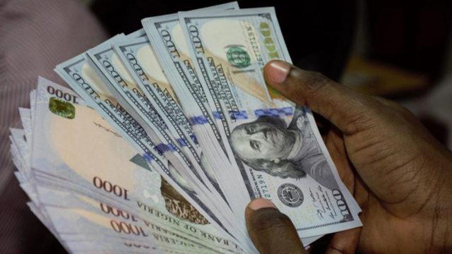 Naira starts first trading day on good note at N422/$ 1 Naira Vs dollar