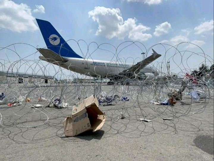 Kabul Airport Closed, Fearful Afghans Rush For The Border 1 Commercial airplane at the Hamid Karzai International Airport