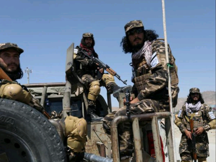 Members of the Taliban Intelligence Special Forces guard the military airfield in Kabul