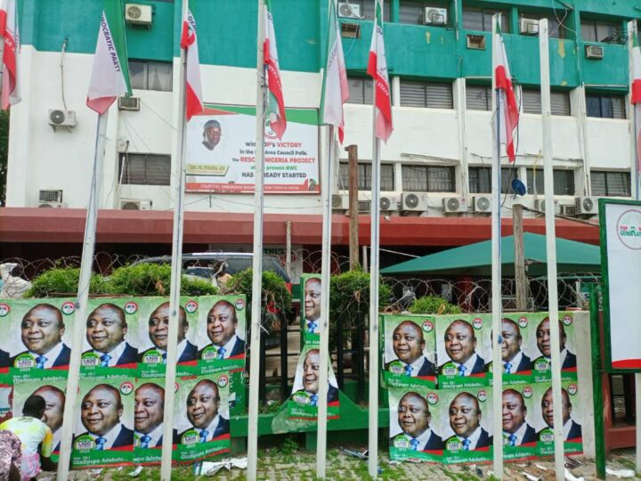 Peoples Democratic Party (PDP) National Head Office with Ogun State Governorship Candidate, Ladi Adebutu's Poster