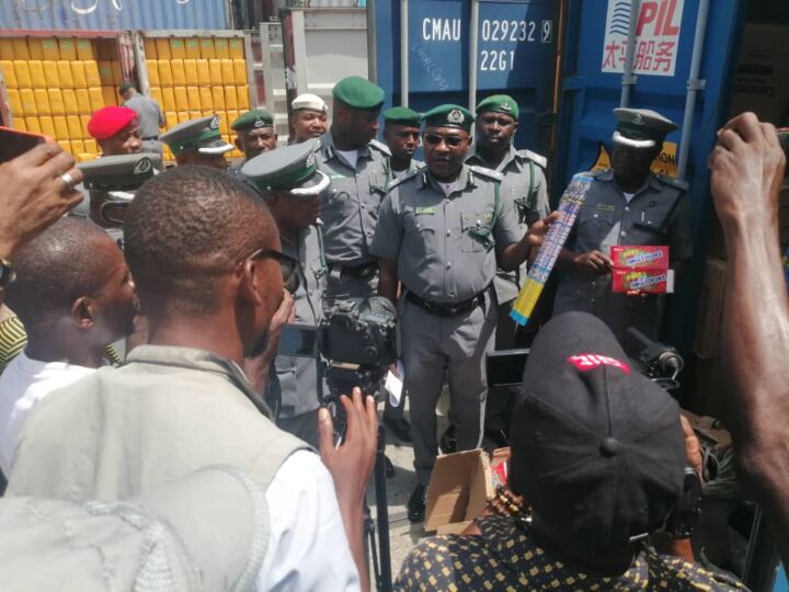 Onne Customs Area Controller, Compt Imam Baba inspecting some Seized Contrabands